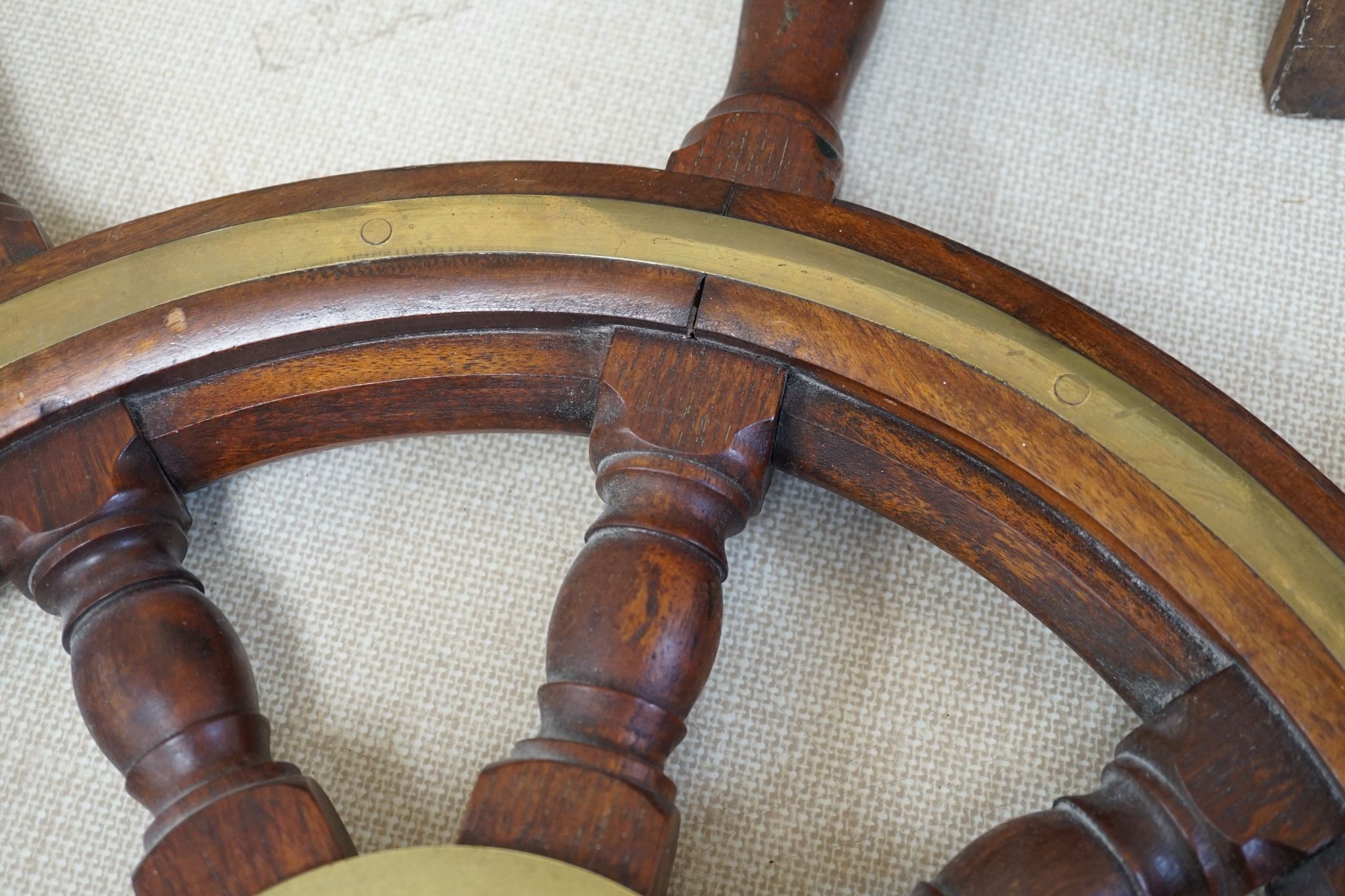 A 19th century mahogany and brass mounted ship's wheel 77cm